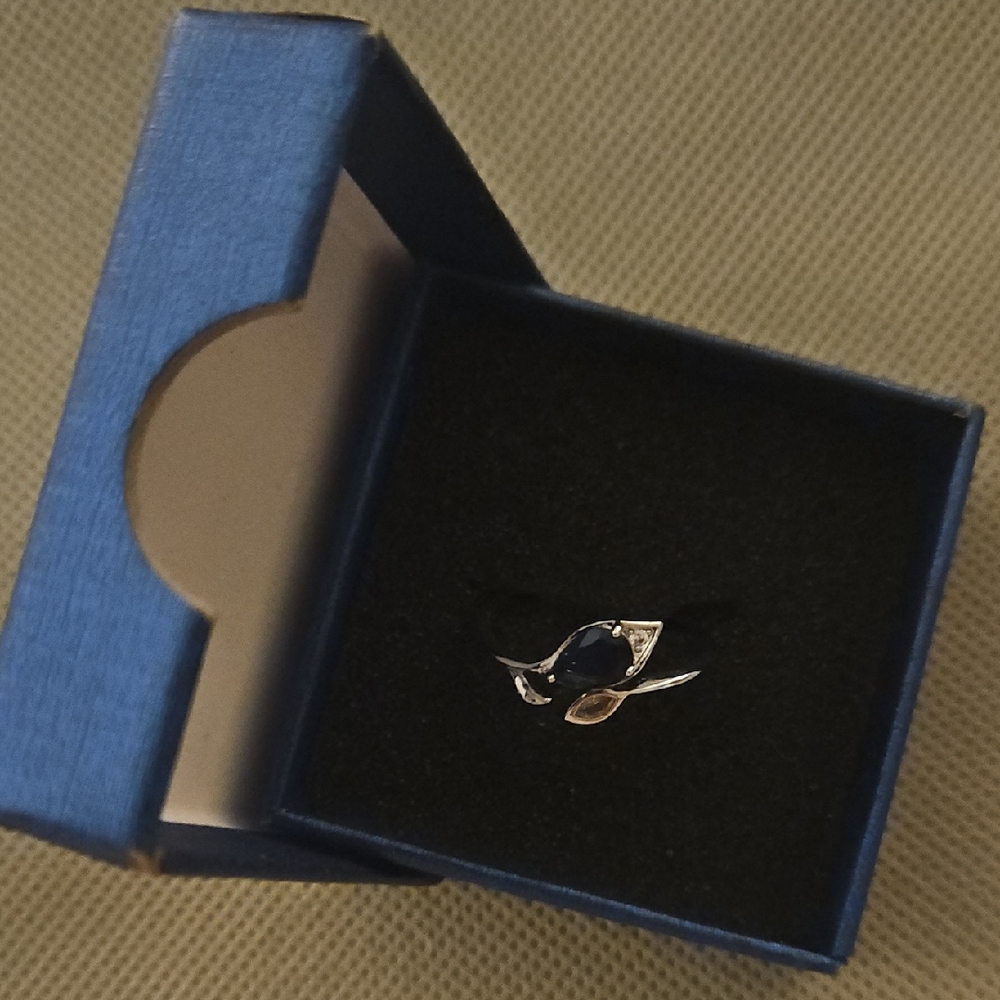 Size 8 Silver and Blue Sapphire And Zirconia Ring.  $4.99 Shipping.